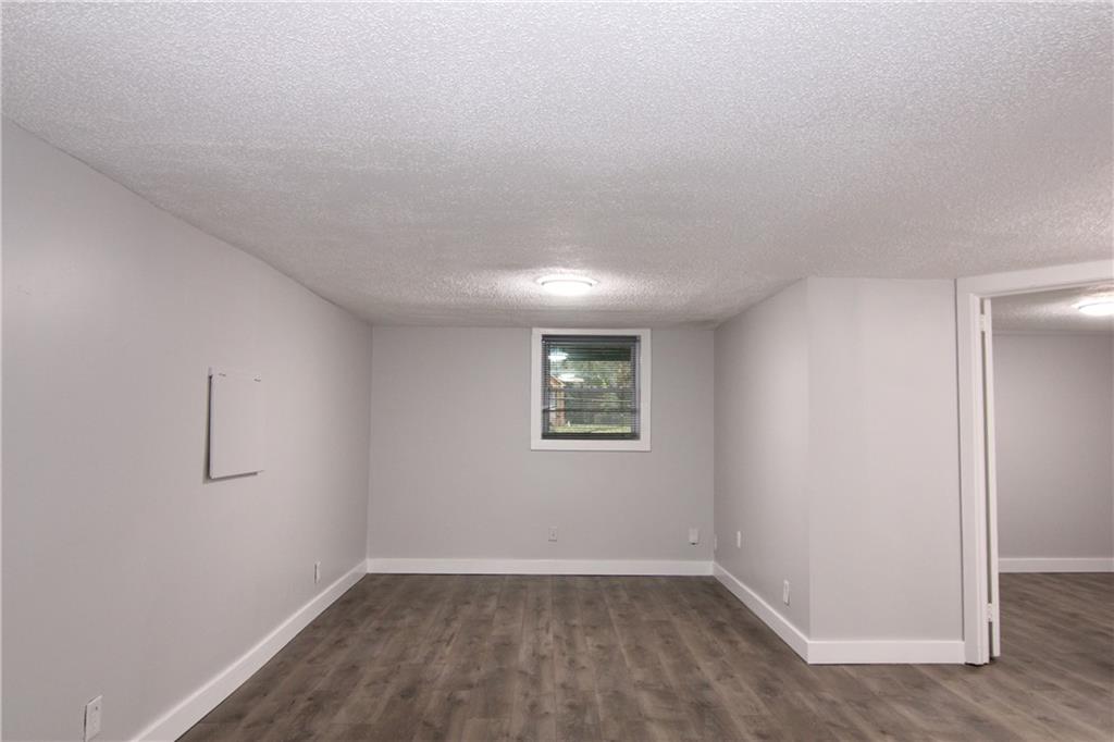 2187 Plantation Lane, Unit B Chamblee, GA 30341 - Photo 11 of 25 an empty room with a window