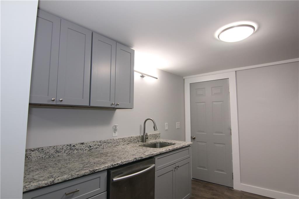 2187 Plantation Lane, Unit B Chamblee, GA 30341 - Photo 6 of 25 a view of a sink and cabinets