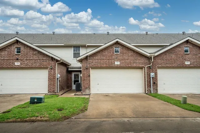 a view of a backyard of the house