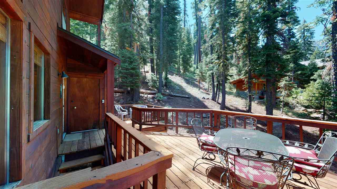 1069 Snow Crest Road Alpine Meadows, CA 96146 - Photo 17 of 20 a balcony with wooden floor and outdoor seating