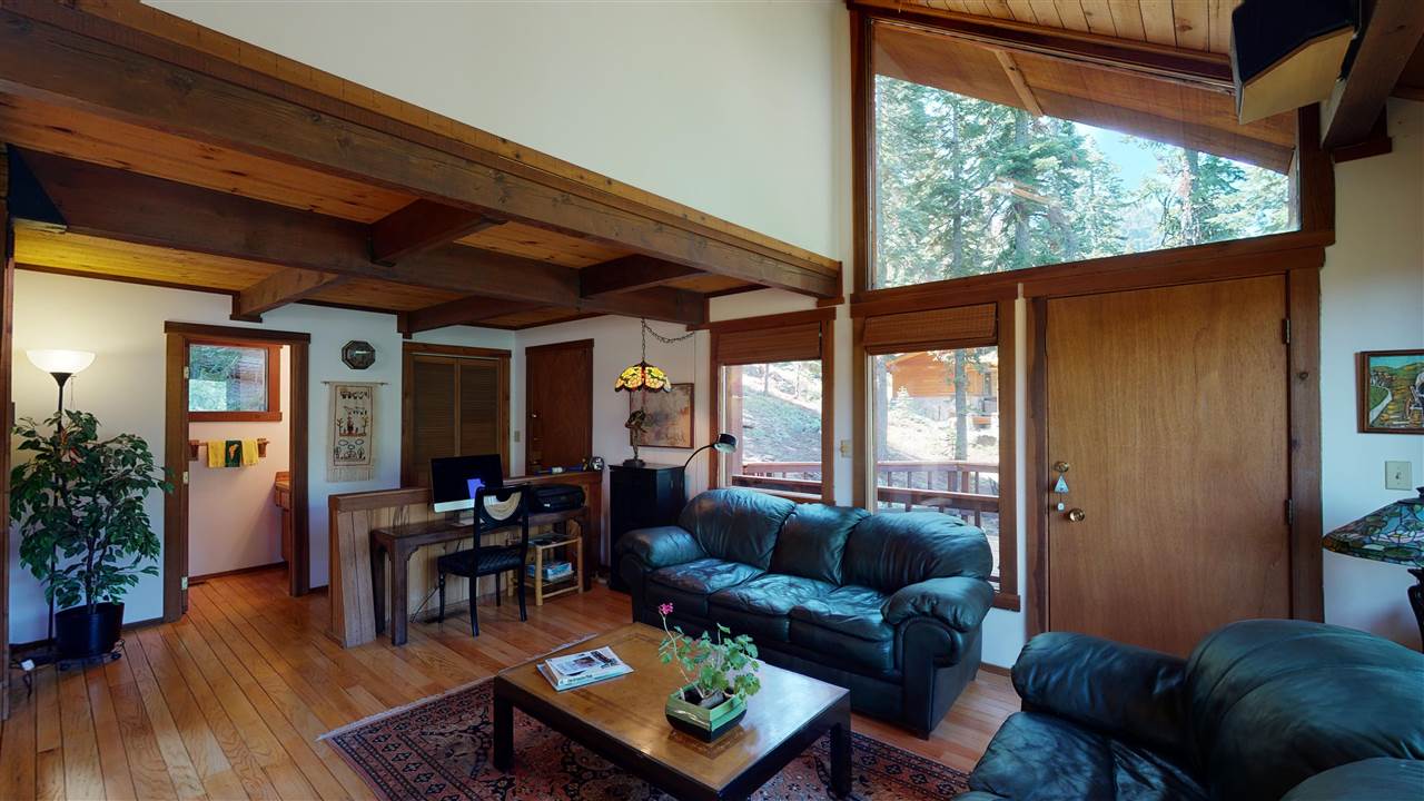 1069 Snow Crest Road Alpine Meadows, CA 96146 - Photo 3 of 20 a living room with furniture and a large window
