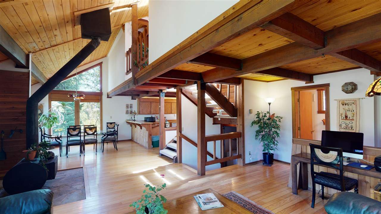 1069 Snow Crest Road Alpine Meadows, CA 96146 - Photo 6 of 20 a living room with furniture or wooden floor and a large window