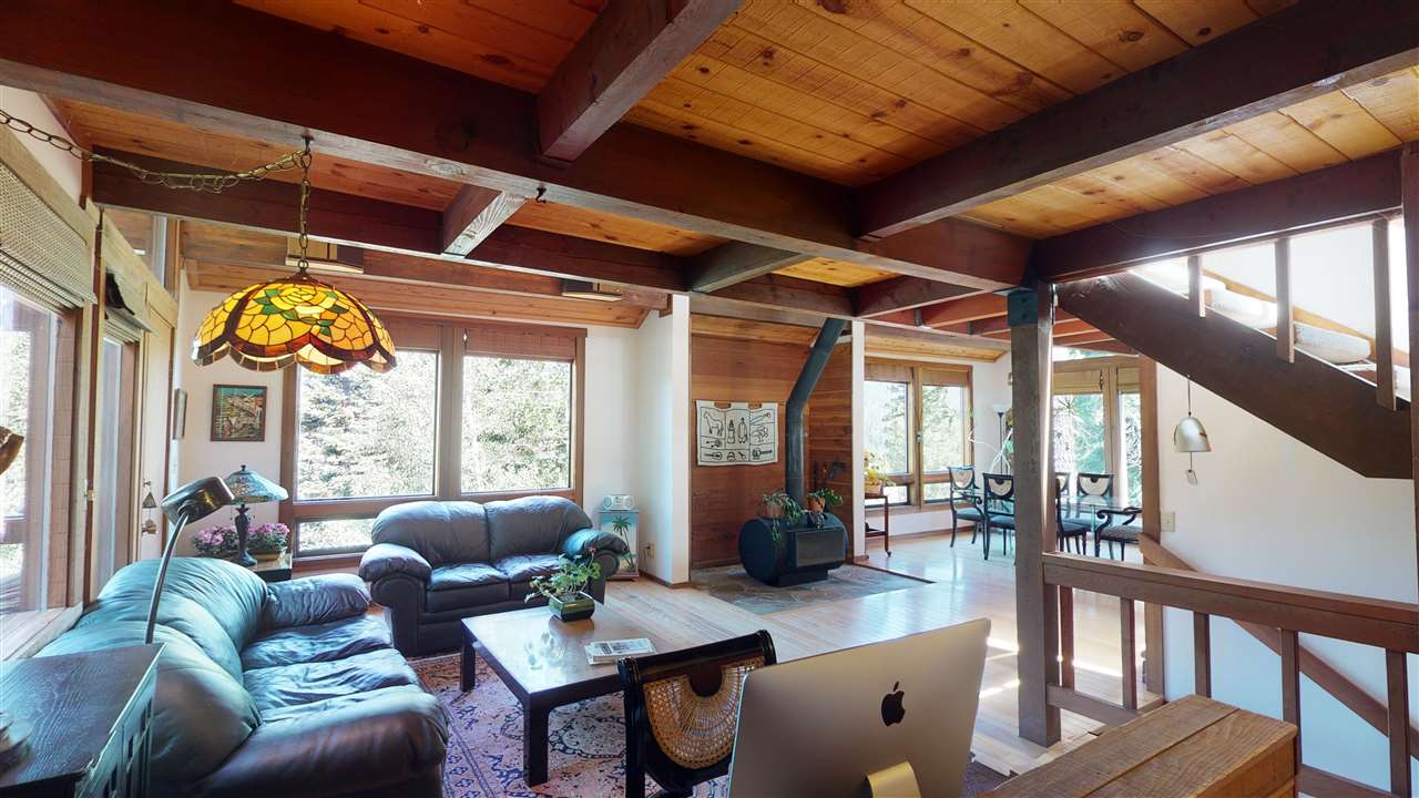 1069 Snow Crest Road Alpine Meadows, CA 96146 - Photo 7 of 20 a living room with furniture and a large window