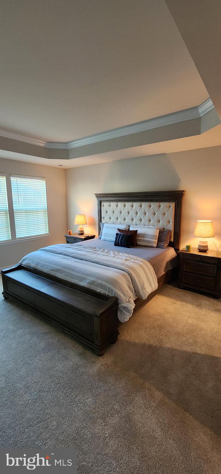 104 Commerce Sicklerville, NJ 08081 - Photo 11 of 16 a bedroom with bed and window