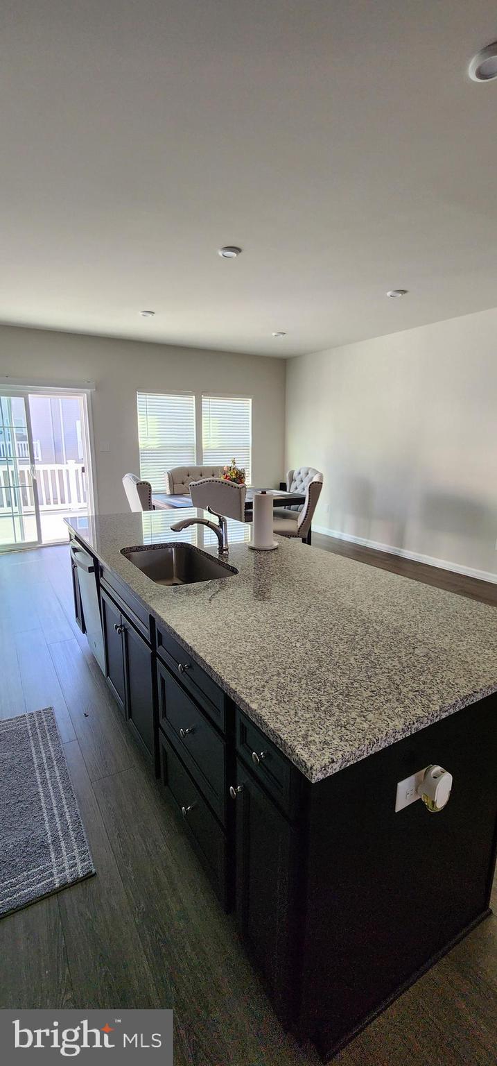 104 Commerce Sicklerville, NJ 08081 - Photo 5 of 16 a kitchen with counter top space and wooden floor