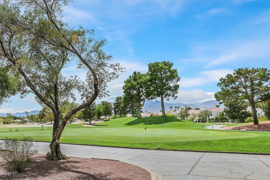 5421 Painted Mirage Road Las Vegas, NV 89149 - Photo 29 of 35 View of property's community with a mountain view and golf course view