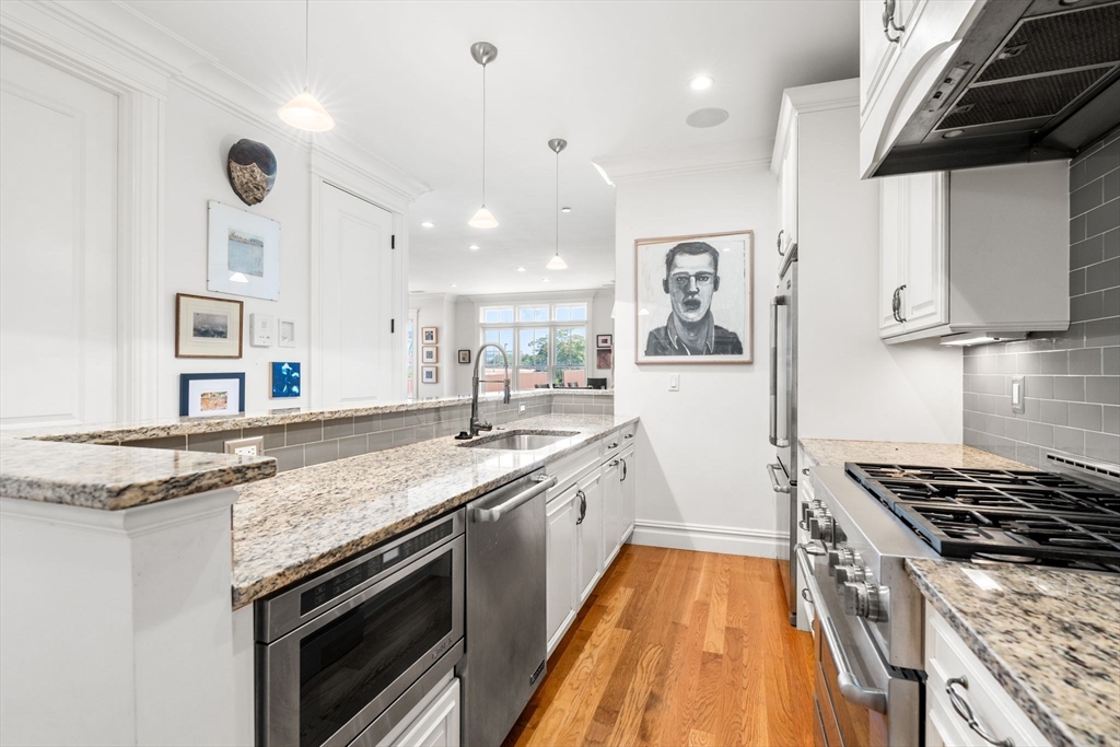 3 M Street, Unit 3 Boston, MA 02127 - Photo 12 of 34 a kitchen with a stove and a sink