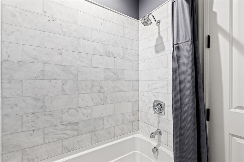 3 M Street, Unit 3 Boston, MA 02127 - Photo 18 of 34 a bathroom with a bathtub