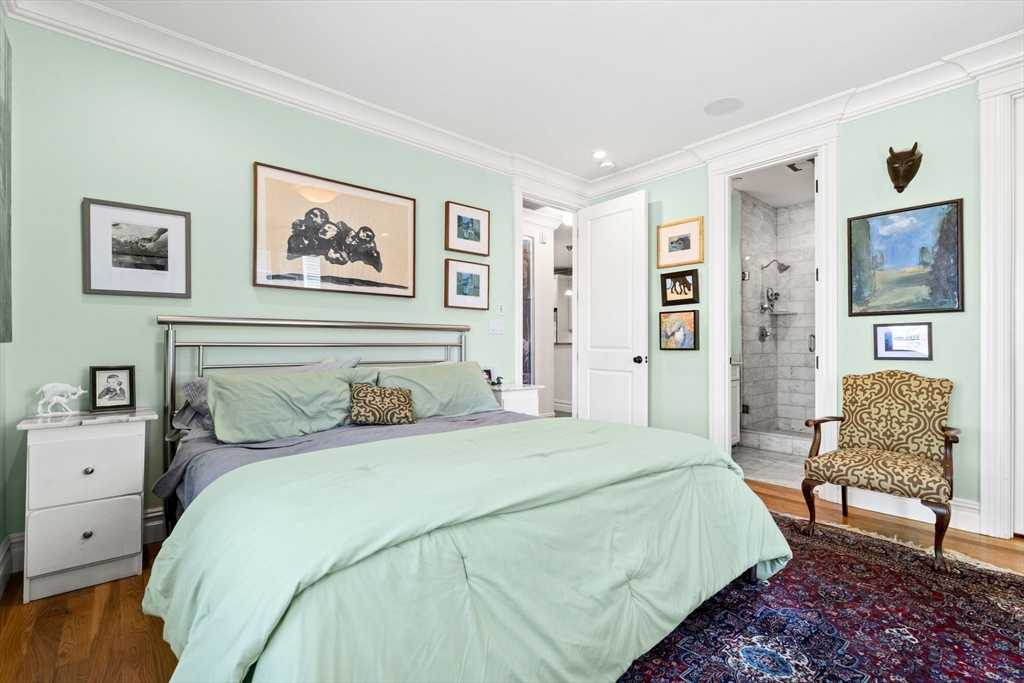 3 M Street, Unit 3 Boston, MA 02127 - Photo 21 of 34 a bedroom with a bed and a couch