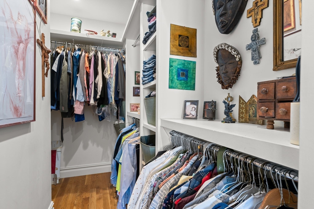 3 M Street, Unit 3 Boston, MA 02127 - Photo 23 of 34 a view of walk in closet with clothes and shoes