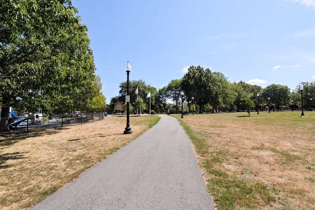 a view of swimming pool with a yard