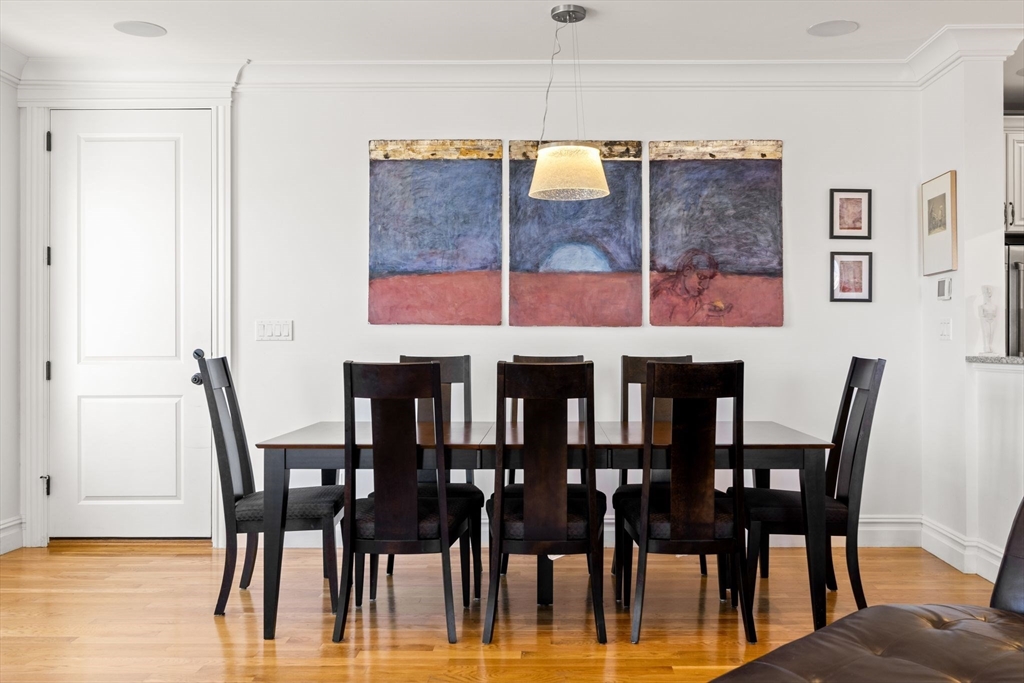 3 M Street, Unit 3 Boston, MA 02127 - Photo 7 of 34 a view of a dining room with furniture and wooden floor