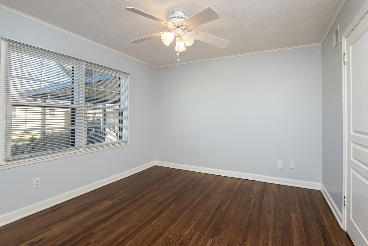 4628 Boyce Road Memphis, TN 38117 - Photo 19 of 25 a view of a room with wooden floor and a window