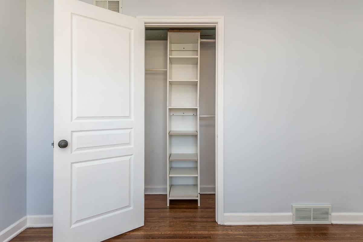 4628 Boyce Road Memphis, TN 38117 - Photo 20 of 25 a view of walk in closet with empty racks