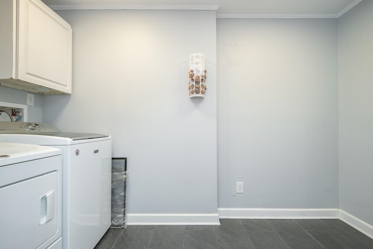4628 Boyce Road Memphis, TN 38117 - Photo 21 of 25 a utility room with dryer and washer