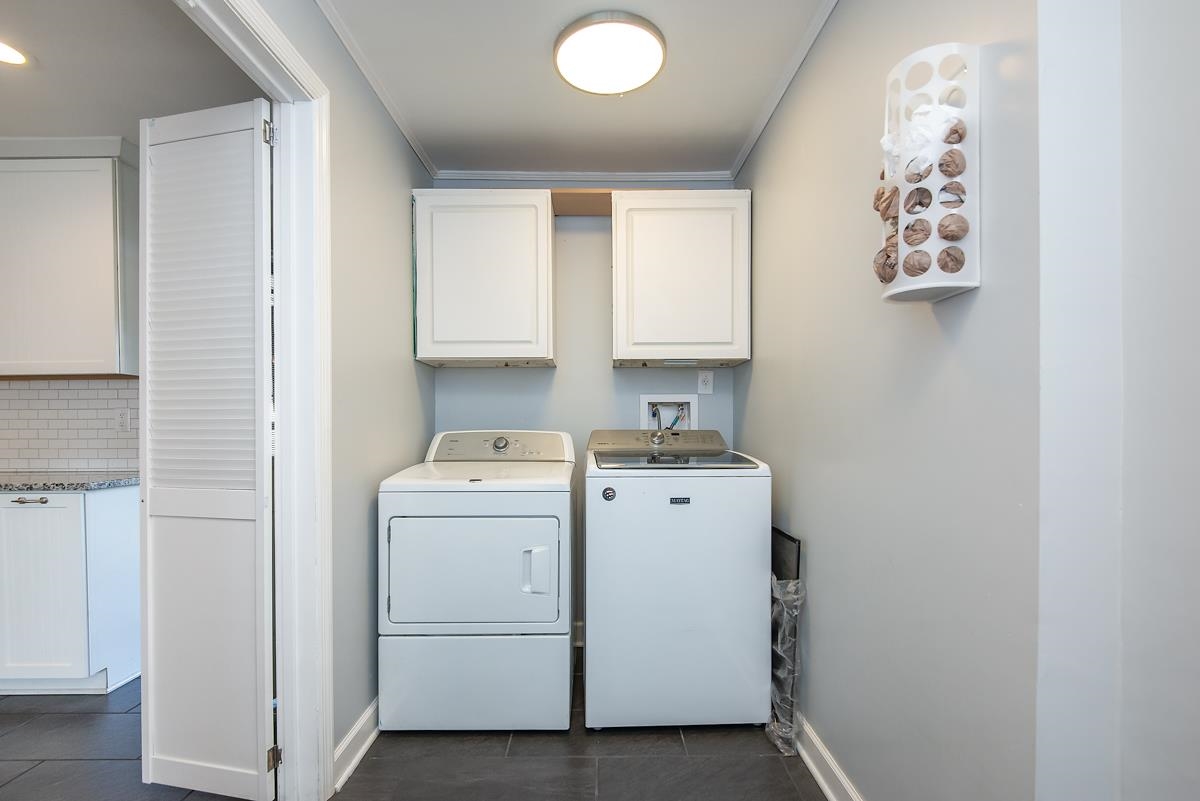 4628 Boyce Road Memphis, TN 38117 - Photo 22 of 25 a view of utility room with washer and dryer