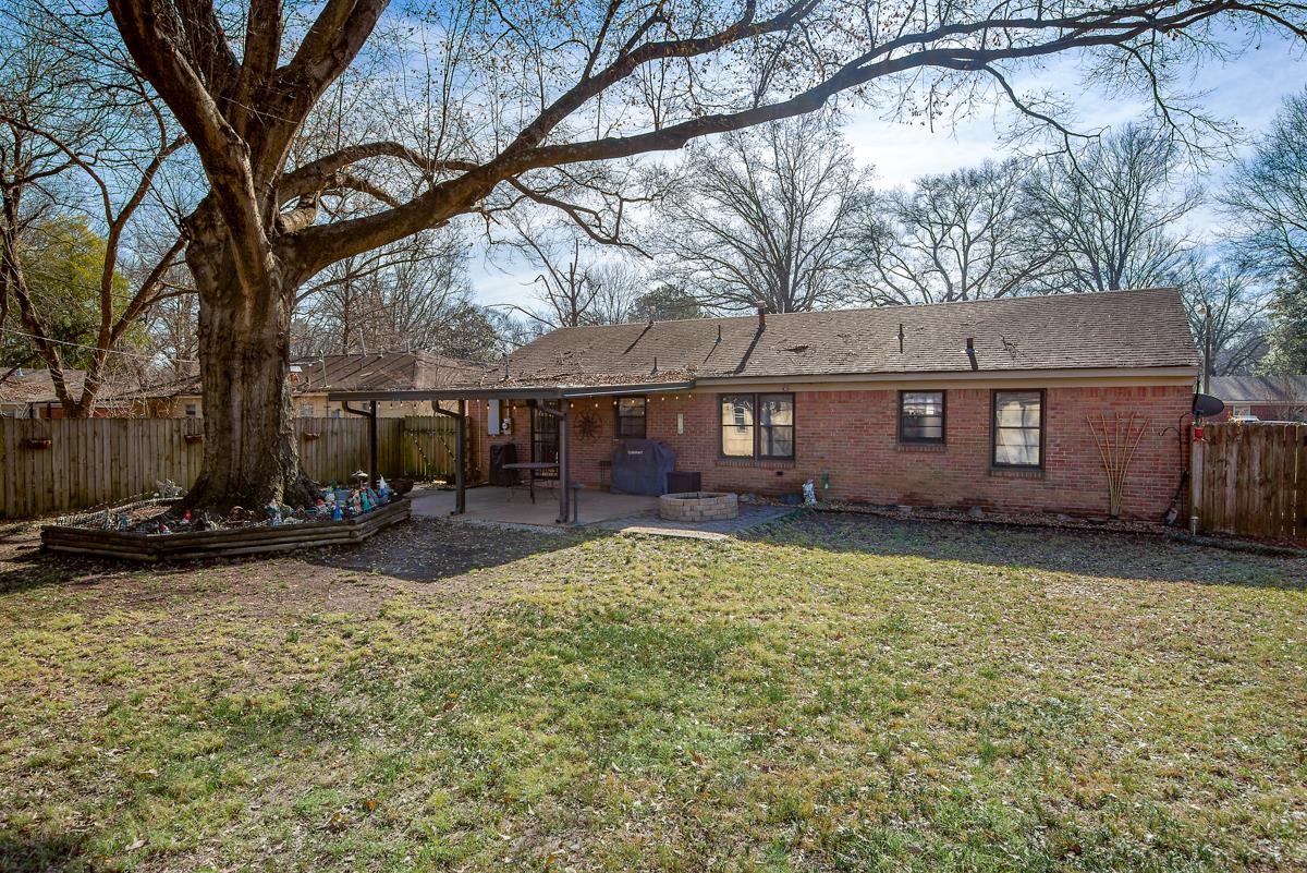 4628 Boyce Road Memphis, TN 38117 - Photo 23 of 25 a view of a house with backyard porch and sitting area