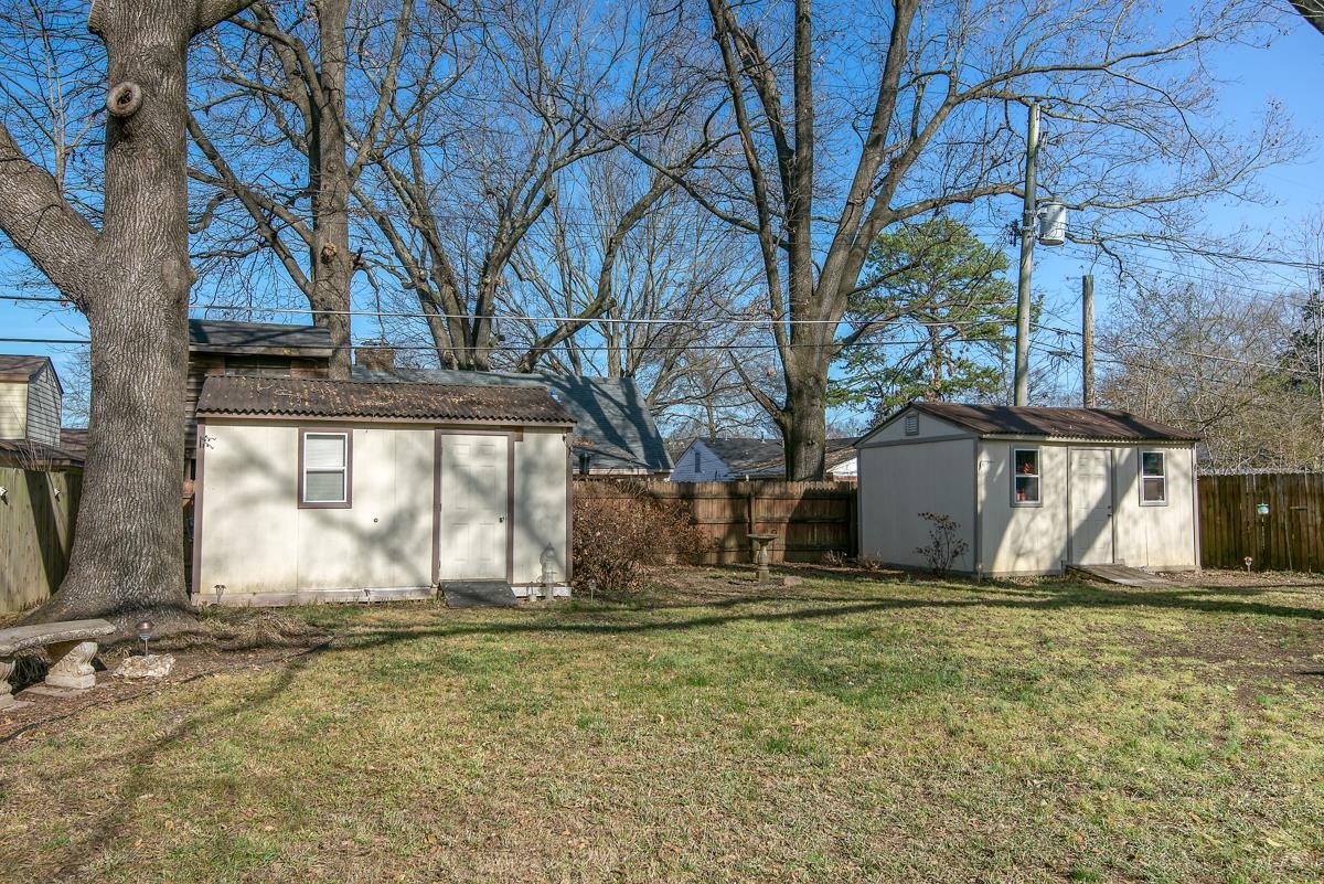 4628 Boyce Road Memphis, TN 38117 - Photo 25 of 25 a house with trees in front of it