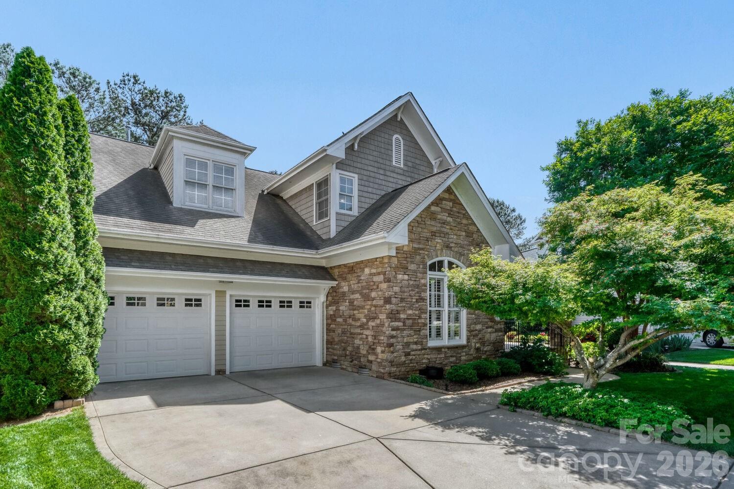 183 Lavender Bloom Loop Mooresville, NC 28115 - Photo 4 of 46 front view of a house with a garden