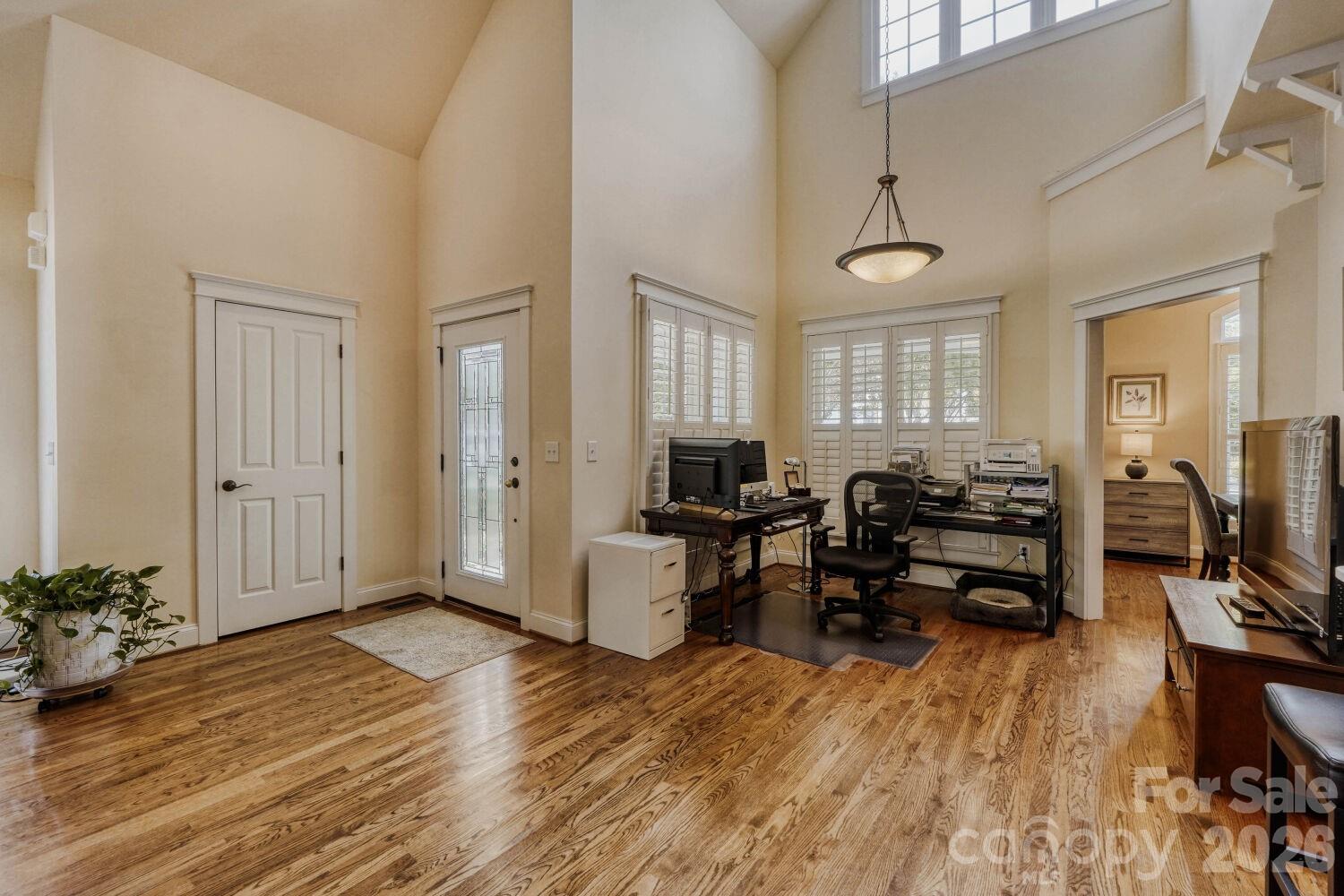 183 Lavender Bloom Loop Mooresville, NC 28115 - Photo 10 of 46 a living room with furniture or wooden floor and a large window