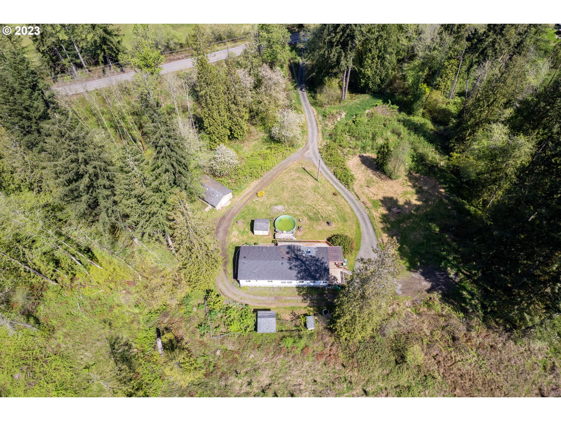 69084 Nicolai Road Rainier, OR 97048 - Photo 3 of 30 a aerial view of a house with a yard