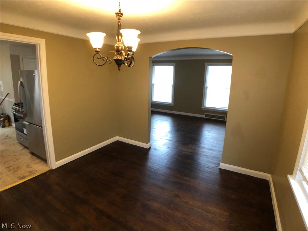 4003 Northampton Road Cleveland Heights, OH 44121 - Photo 4 of 33 This dining room features a beautiful light fixture and nice hardwood flooring.