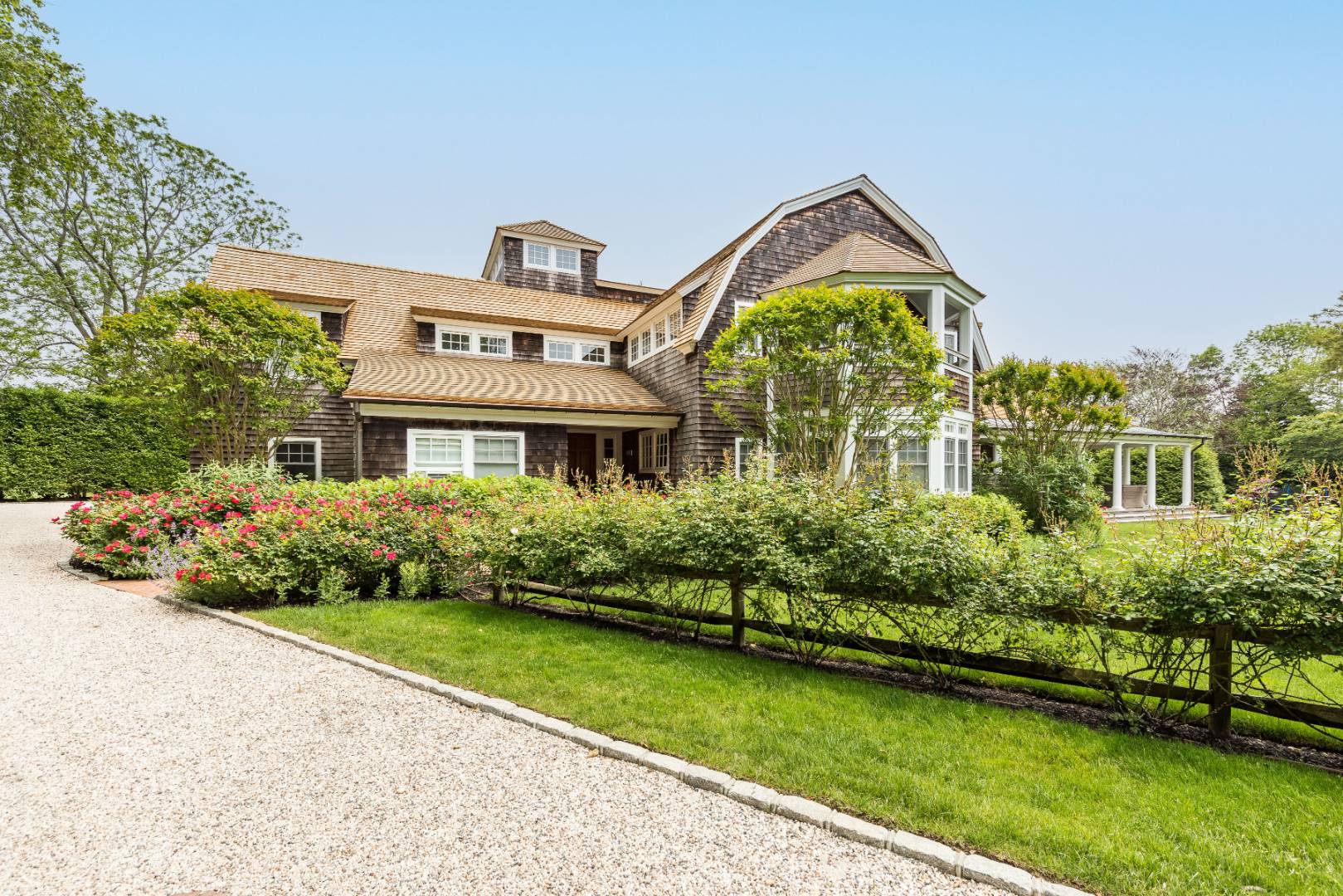 30 Jones Road East Hampton, NY 11937 - Photo 2 of 21 a front view of house with garden