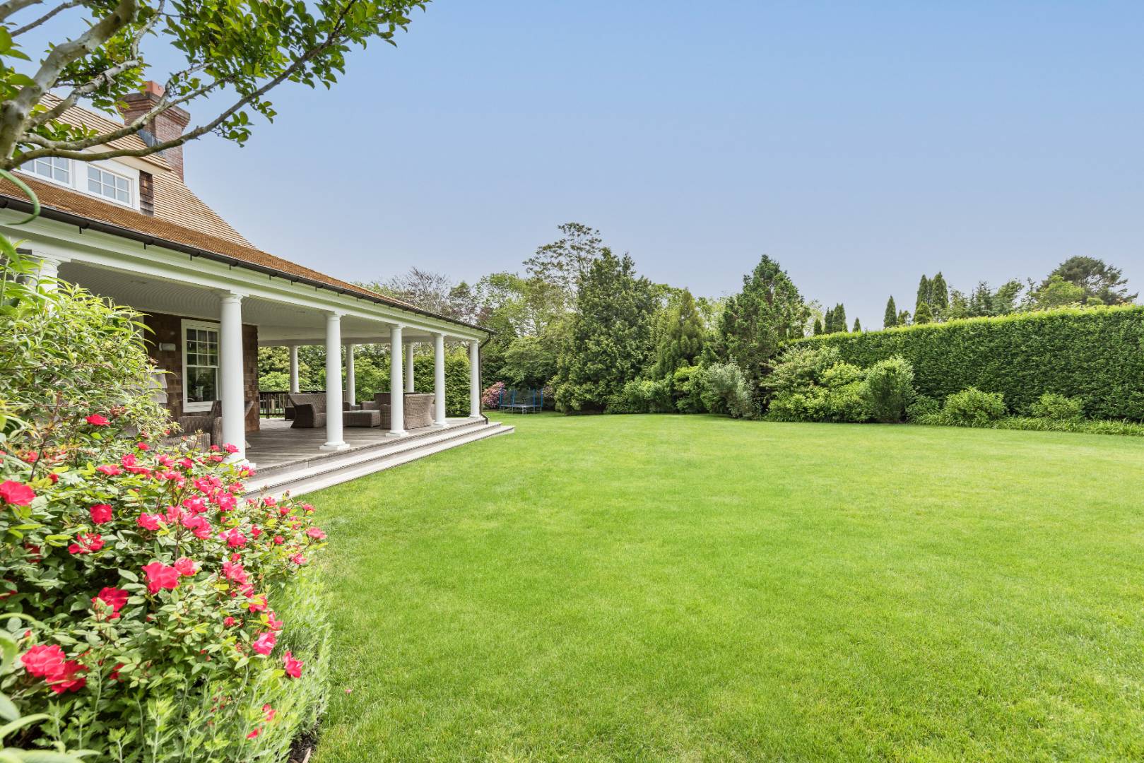 30 Jones Road East Hampton, NY 11937 - Photo 16 of 21 a view of a house with a garden and yard