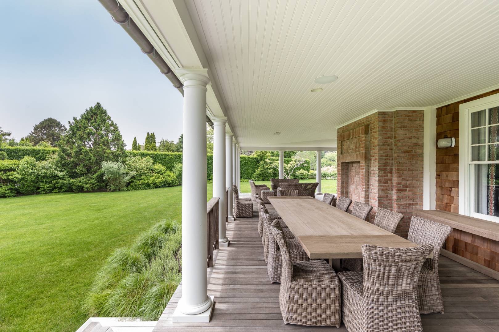 30 Jones Road East Hampton, NY 11937 - Photo 17 of 21 a view of an house with backyard porch and furniture