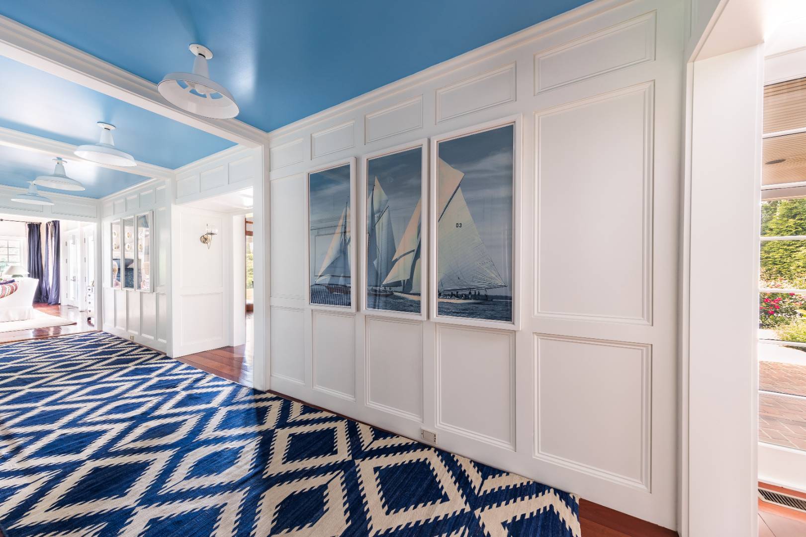 30 Jones Road East Hampton, NY 11937 - Photo 10 of 21 a view of a hallway with wooden floor and staircase