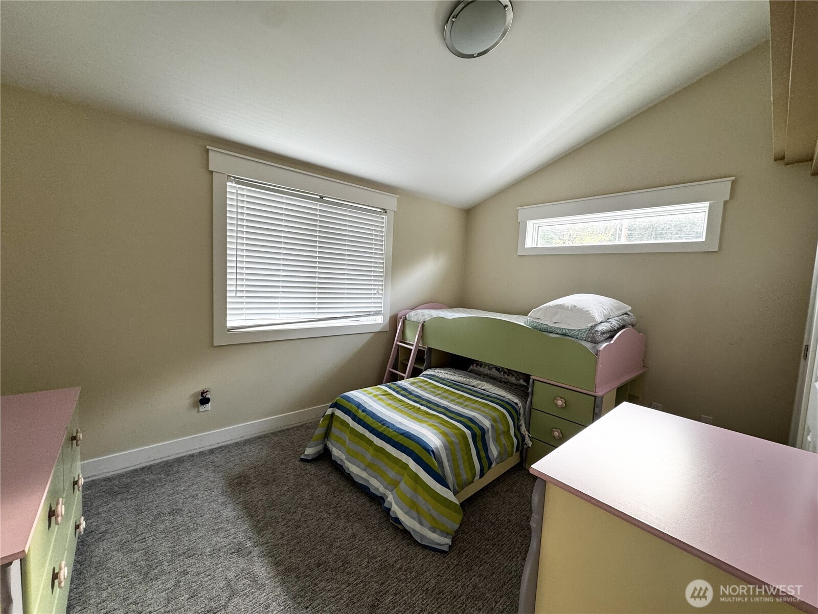 7360 East Grapeview Loop Road Allyn, WA 98524 - Photo 15 of 19 a bedroom with two beds and a window