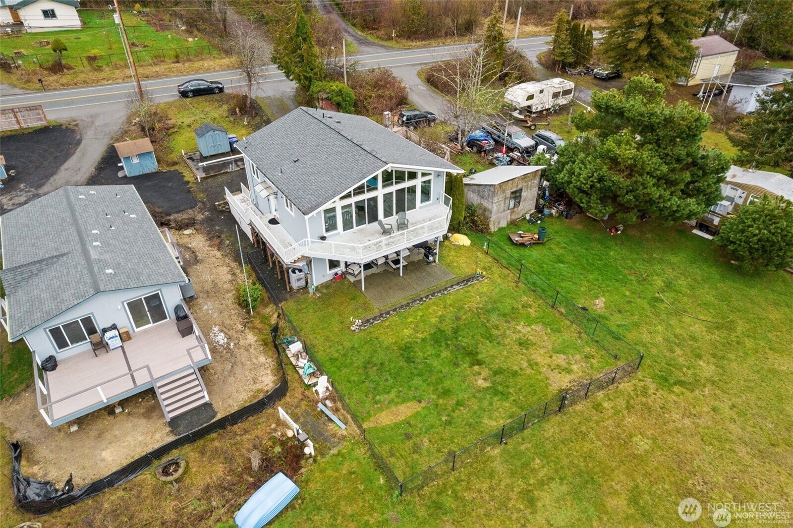 7360 East Grapeview Loop Road Allyn, WA 98524 - Photo 17 of 19 an aerial view of a house with a garden
