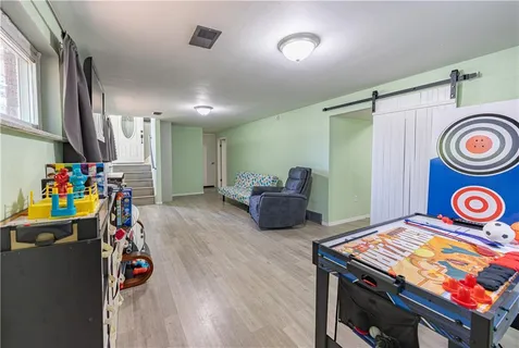 a room with furniture and a window