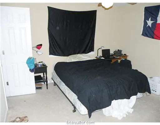 a living room with a bed