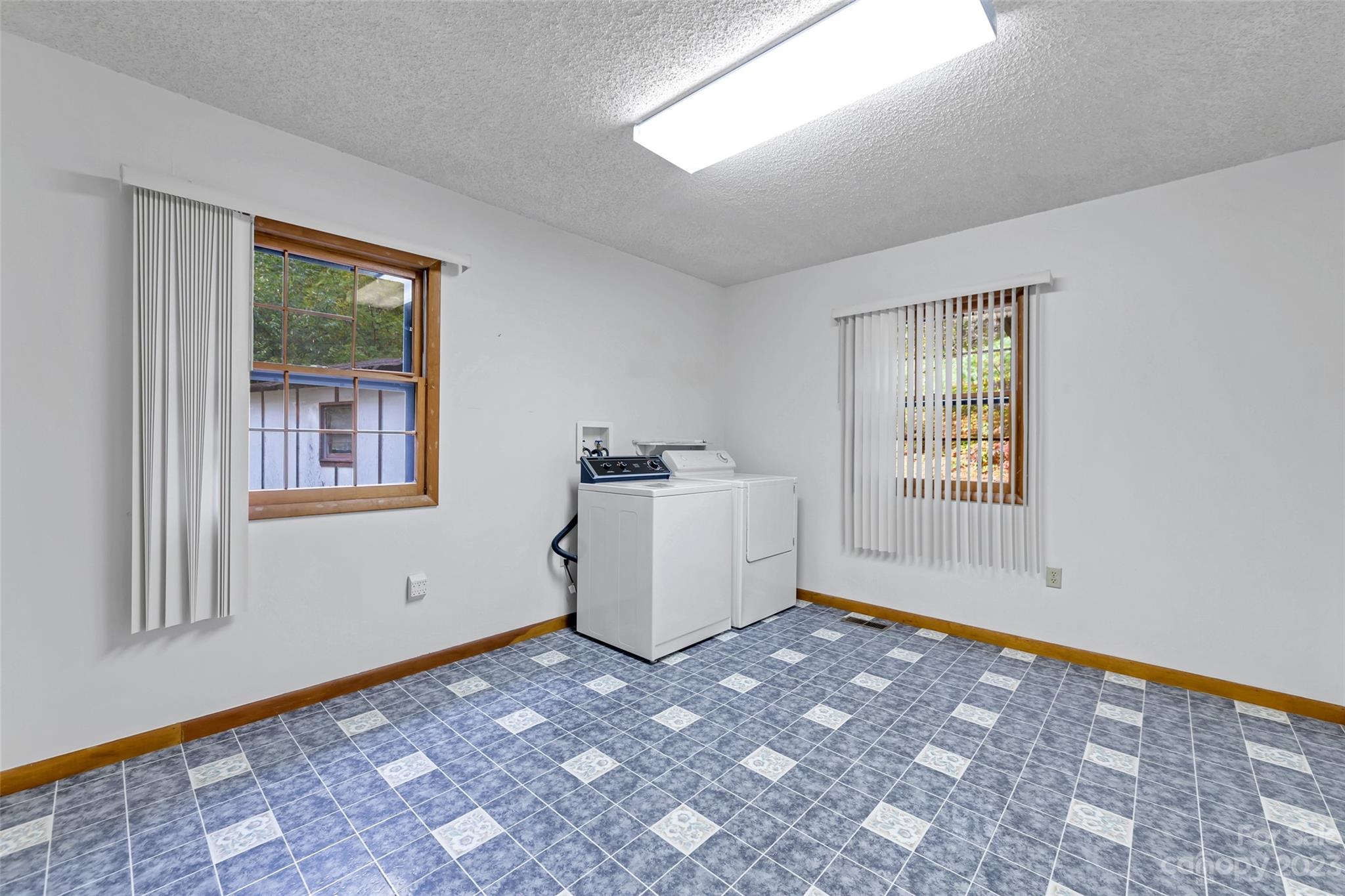 91 Chestnut Hill Road Black Mountain, NC 28711 - Photo 24 of 45 a view of empty room with windows