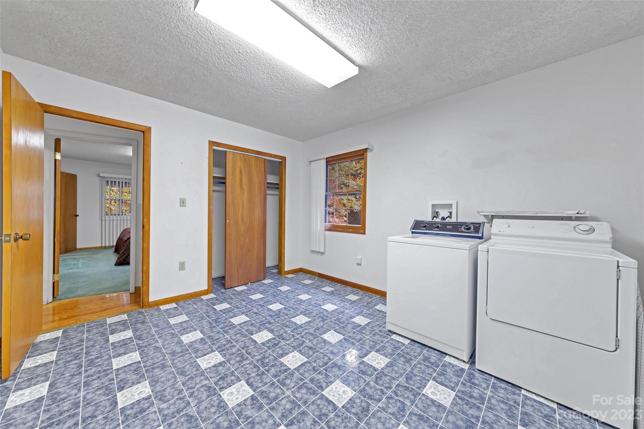 91 Chestnut Hill Road Black Mountain, NC 28711 - Photo 25 of 45 a view of a storage & utility room with closet window