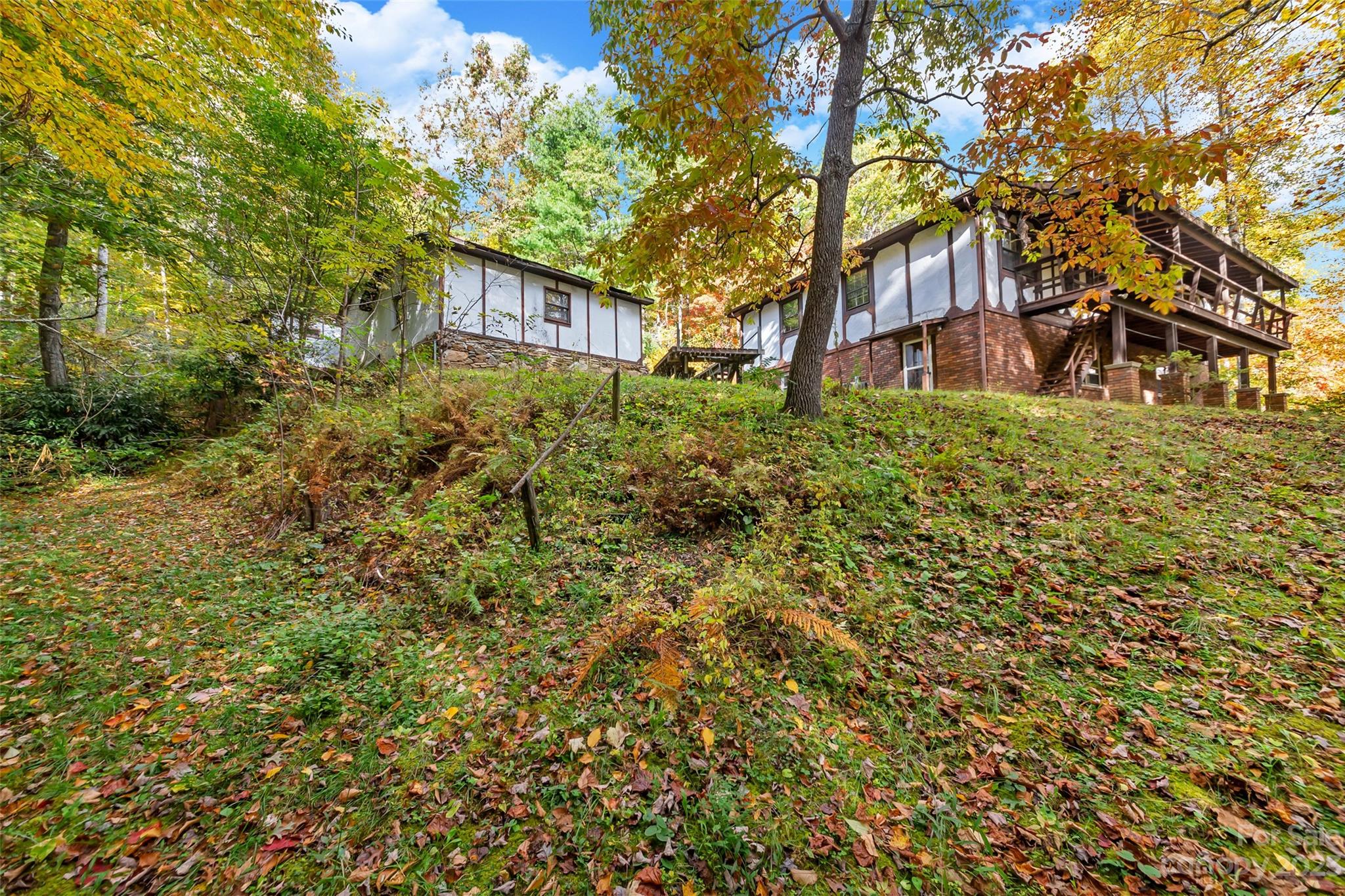 91 Chestnut Hill Road Black Mountain, NC 28711 - Photo 30 of 45 a view of a house with a yard