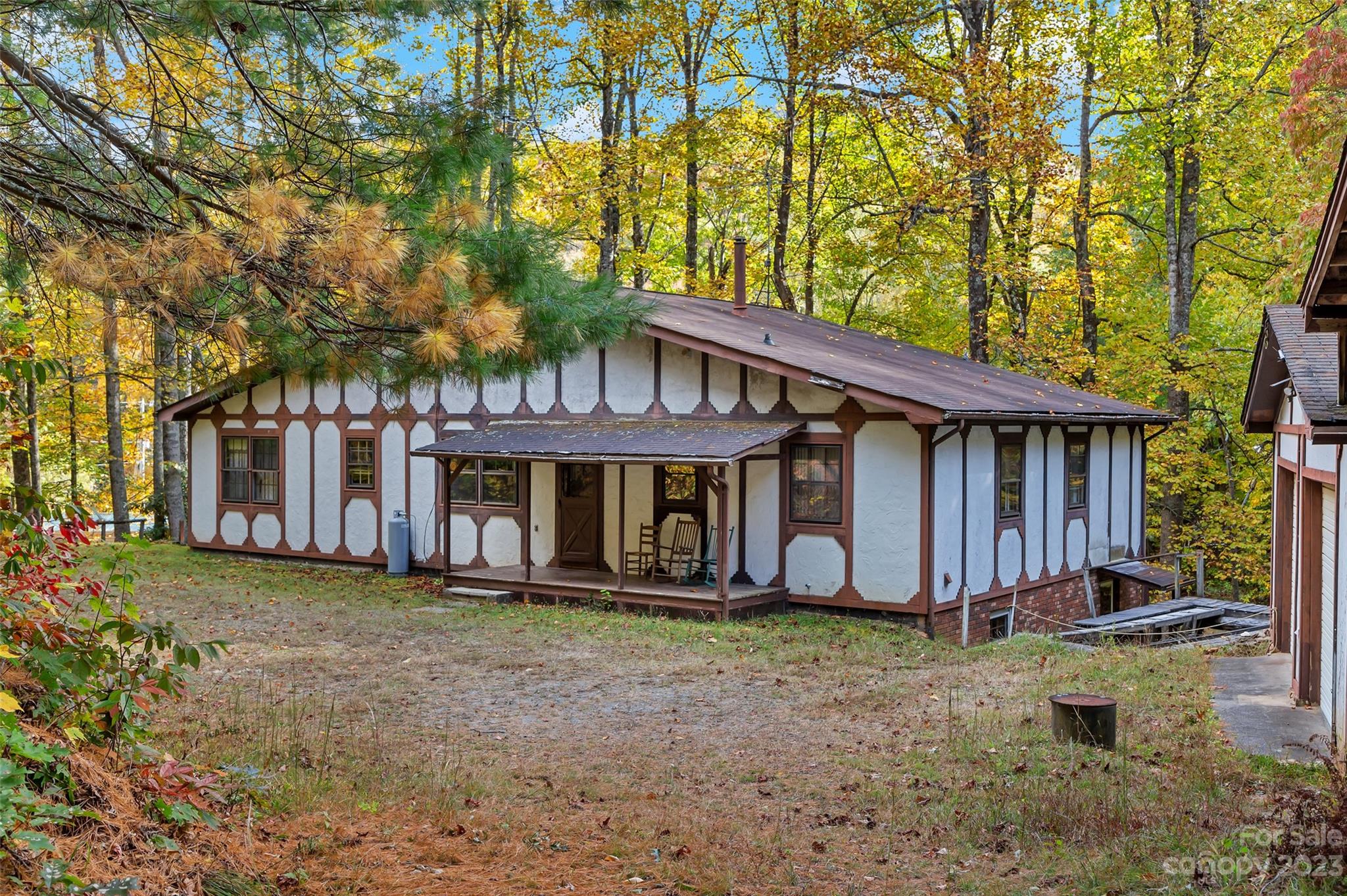 91 Chestnut Hill Road Black Mountain, NC 28711 - Photo 31 of 45 a view of a house with backyard