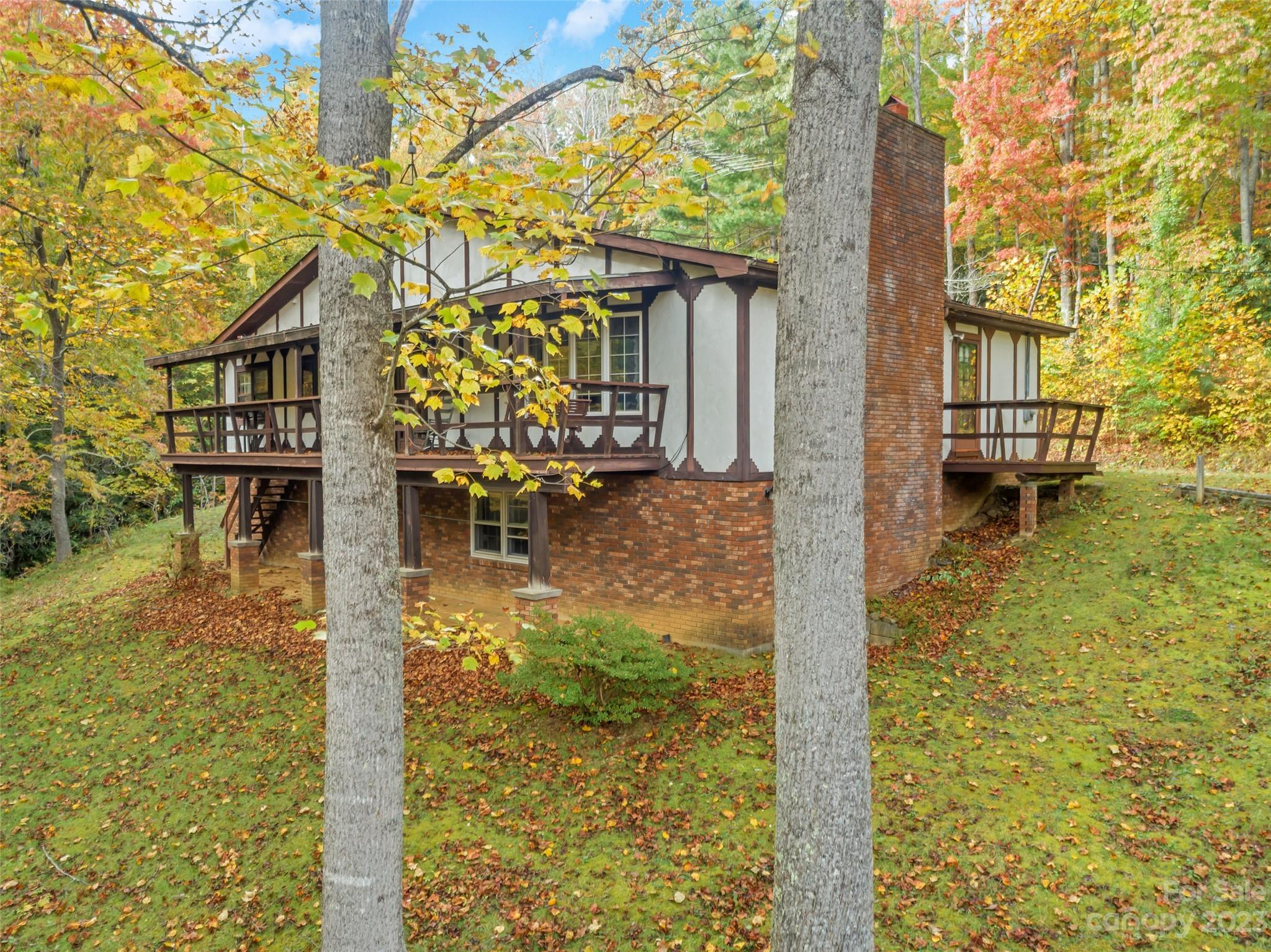 91 Chestnut Hill Road Black Mountain, NC 28711 - Photo 43 of 45 a swimming pool with outdoor seating and yard