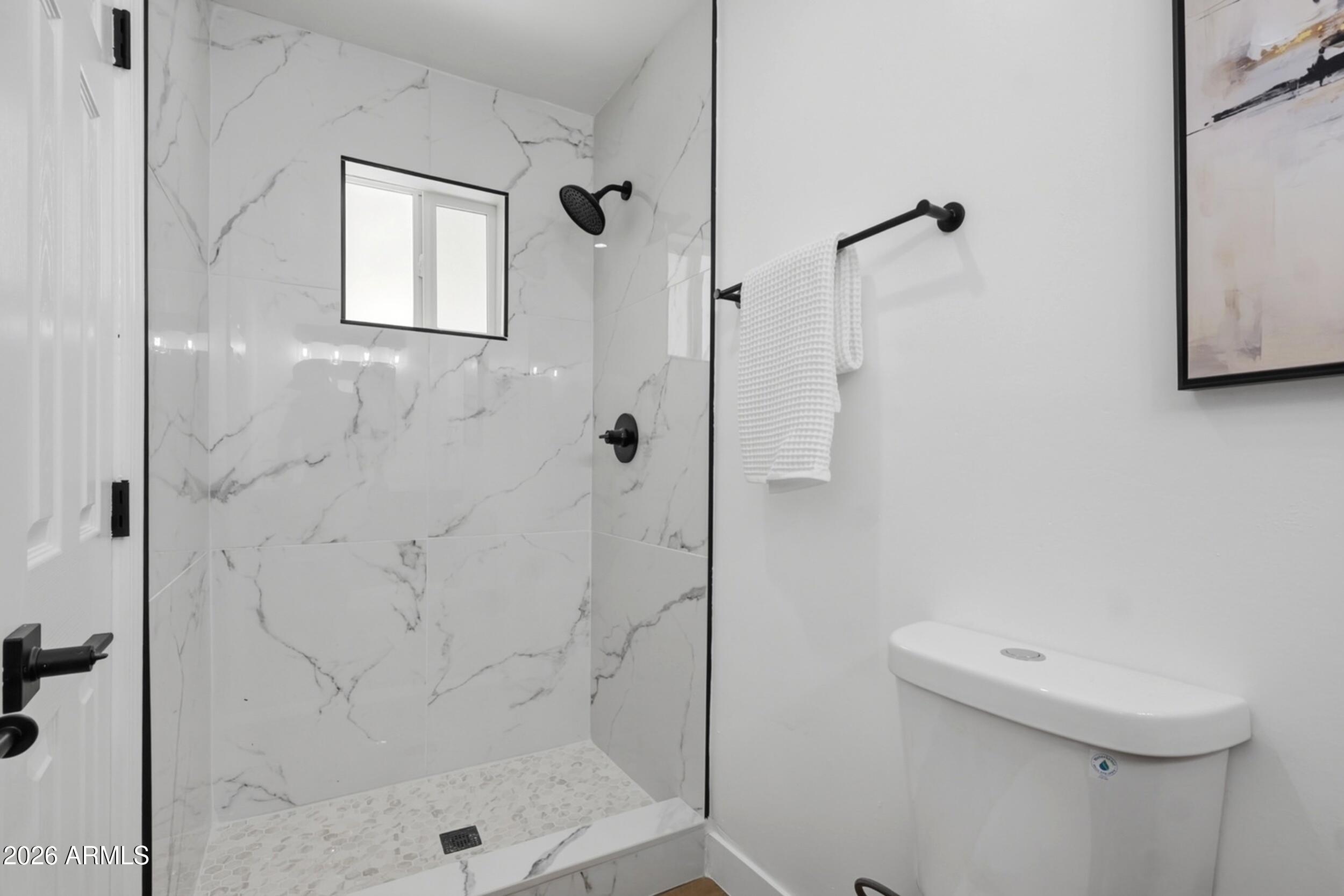 1555 West 6th Street Tempe, AZ 85281 - Photo 14 of 40 a bathroom with a shower