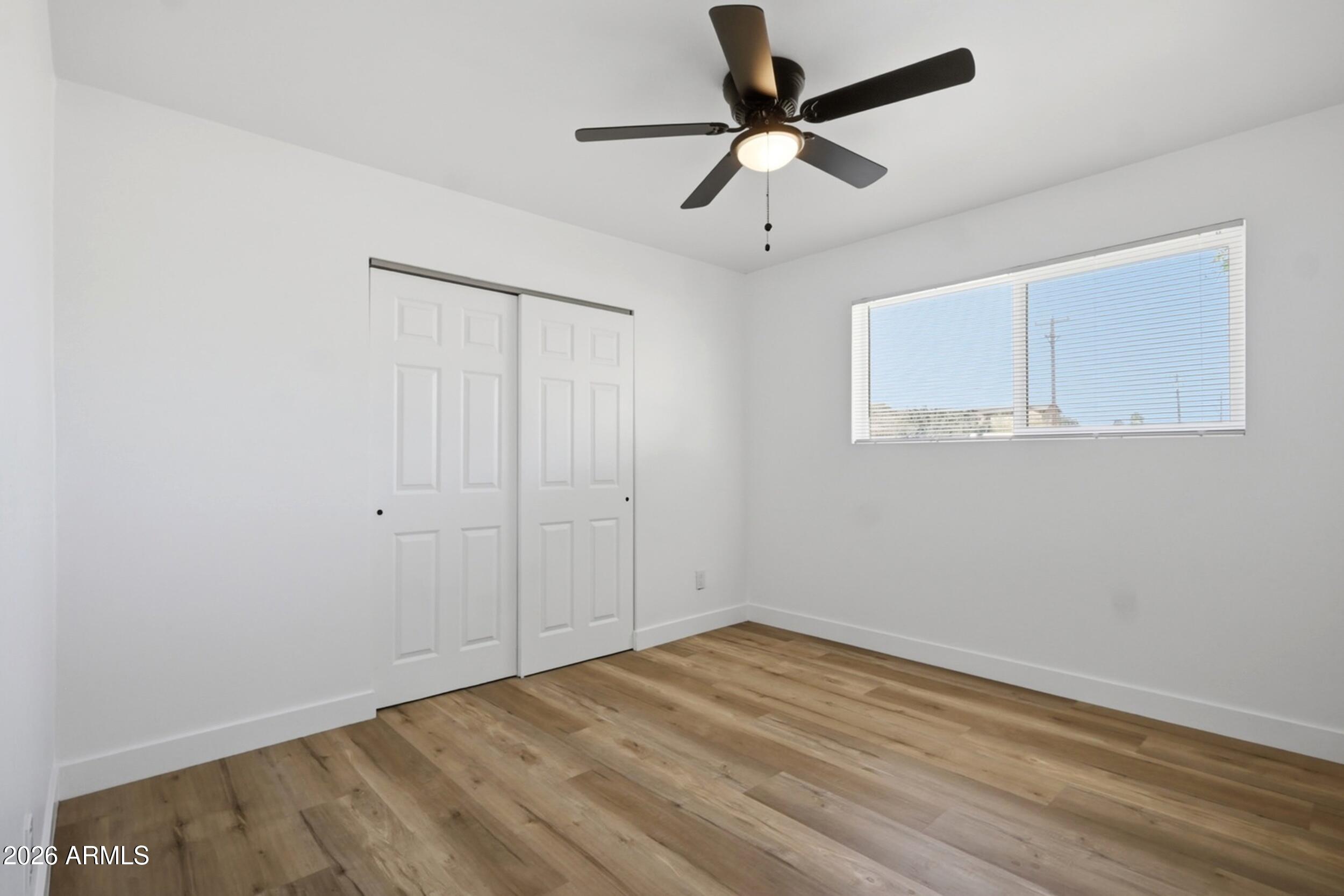 1555 West 6th Street Tempe, AZ 85281 - Photo 17 of 40 wooden floor in an empty room