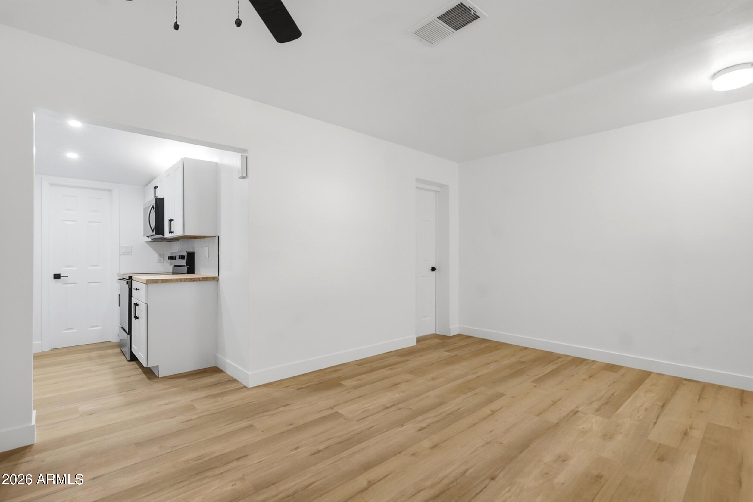 1555 West 6th Street Tempe, AZ 85281 - Photo 21 of 40 a view of kitchen and wooden floor