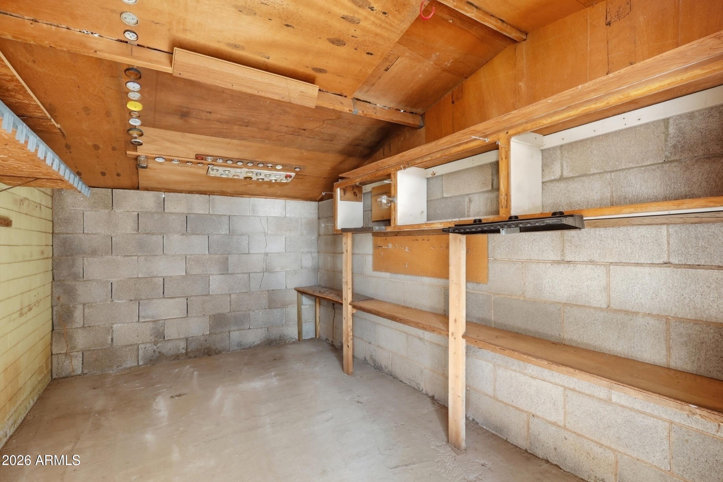 1555 West 6th Street Tempe, AZ 85281 - Photo 33 of 40 a view of a room with racks on the wall