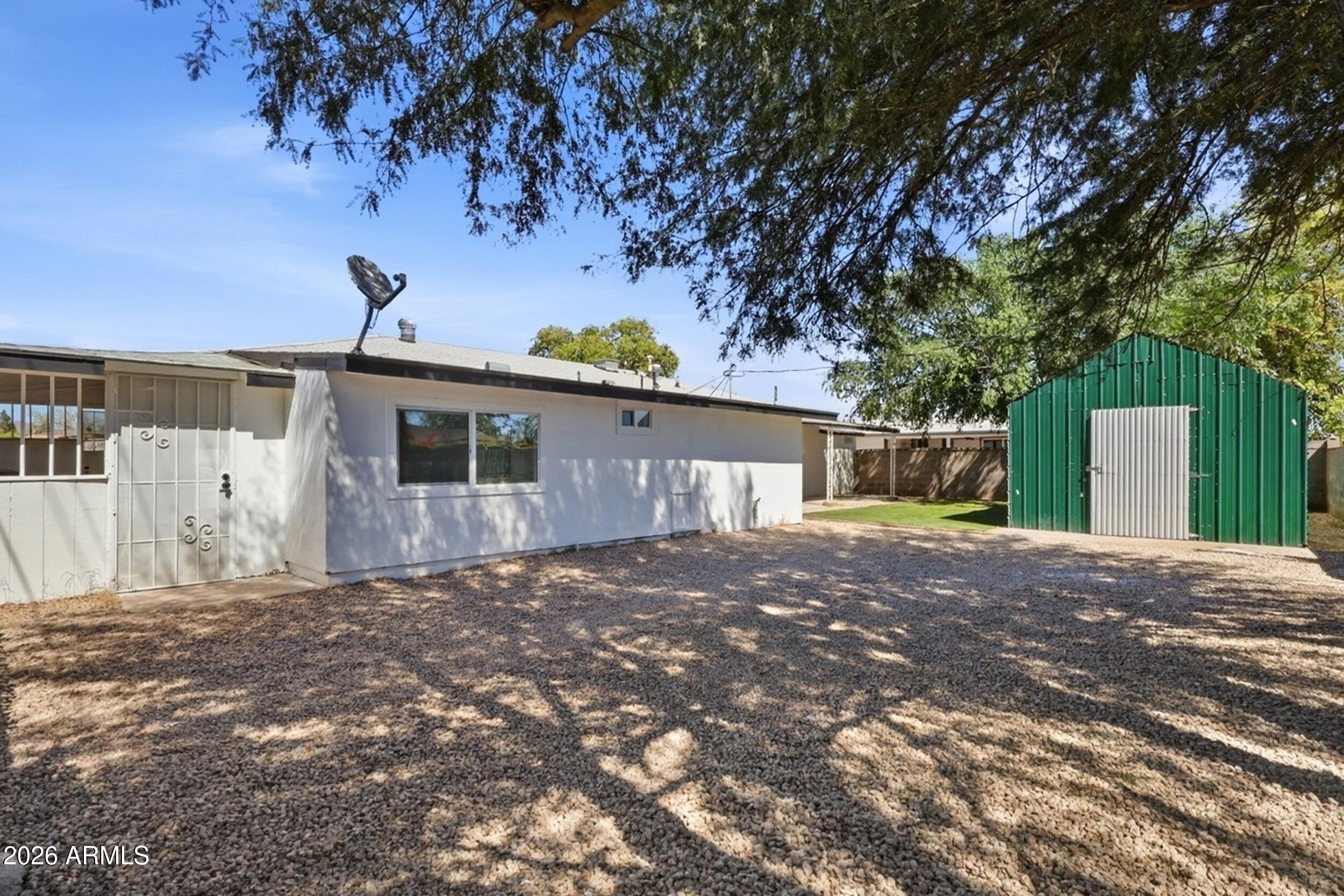 1555 West 6th Street Tempe, AZ 85281 - Photo 37 of 40 a view of a house with a yard