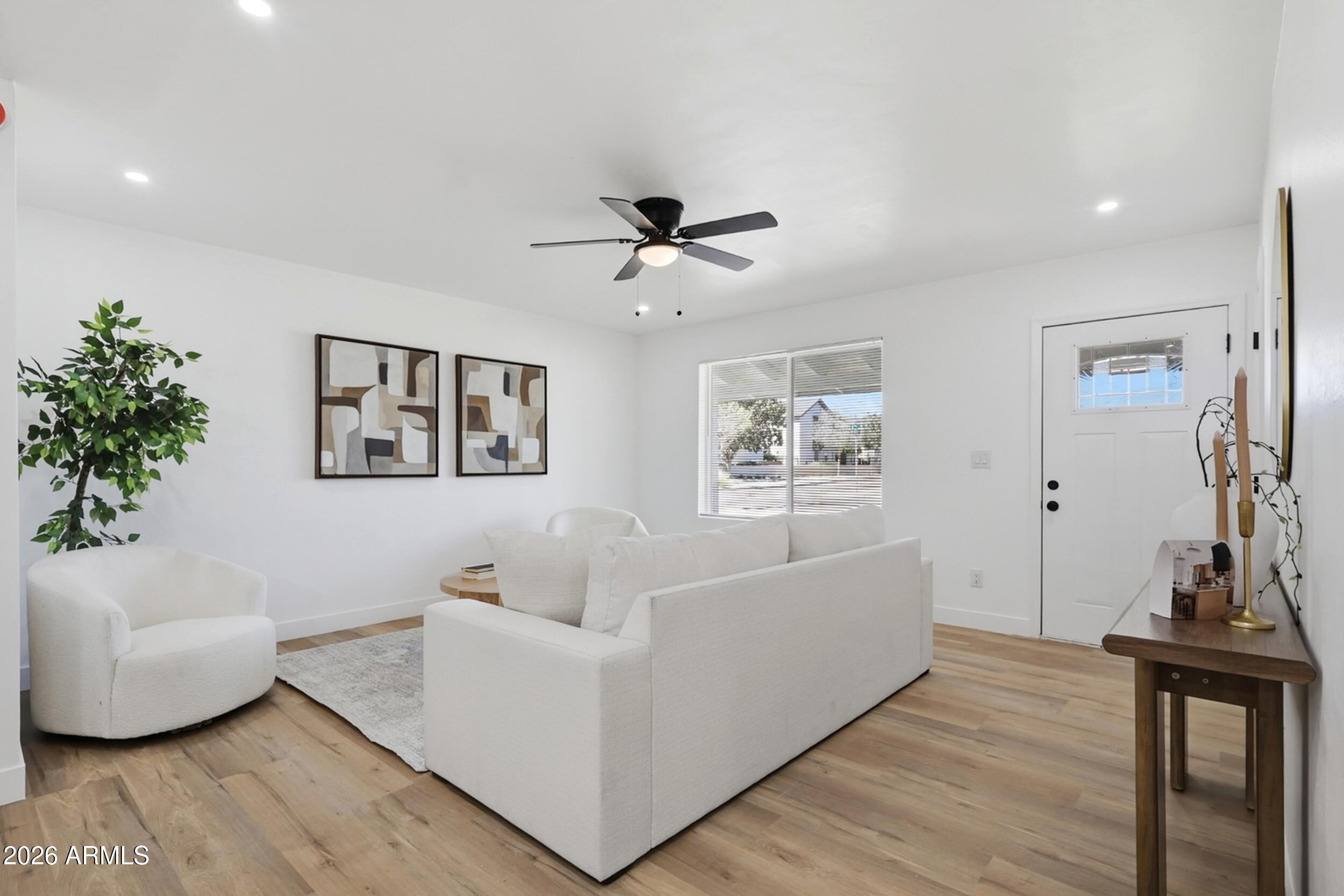 1555 West 6th Street Tempe, AZ 85281 - Photo 5 of 40 a living room with furniture and a large window