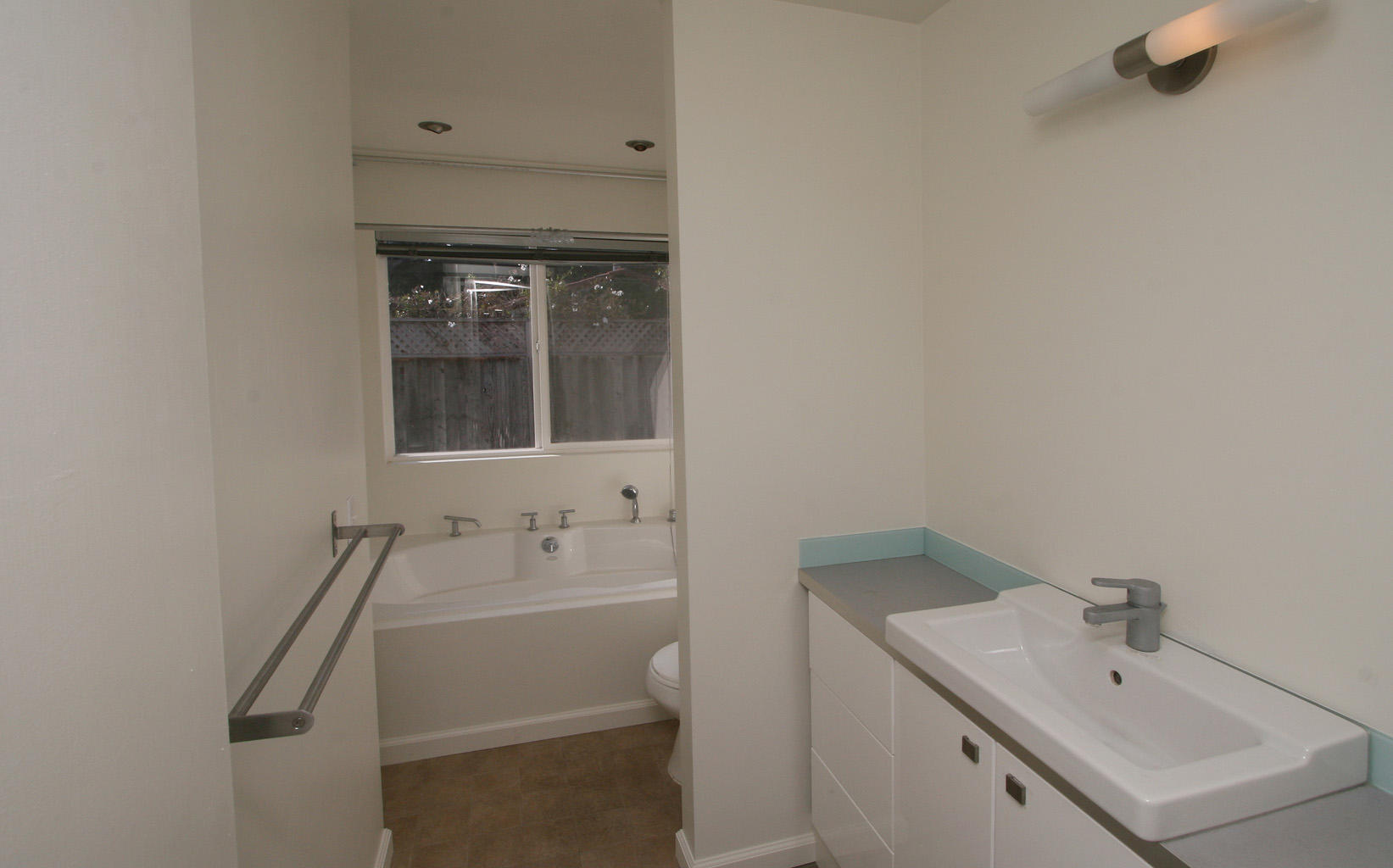 1275 Vallecito Road Carpinteria, CA 93013 - Photo 9 of 11 a bathroom with a sink and mirror