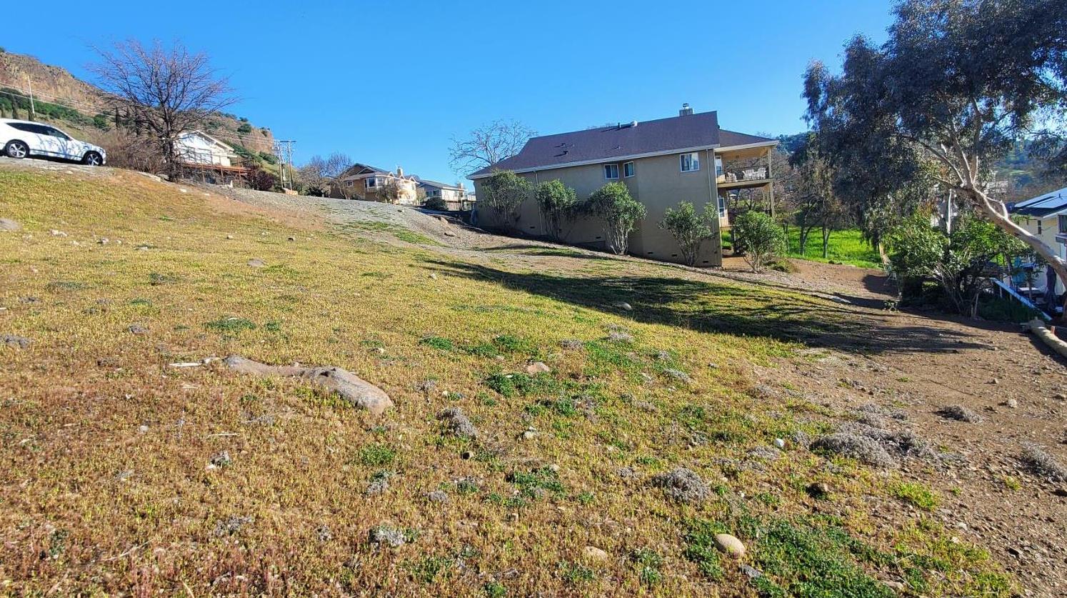 572 Poker Flat Road Copperopolis, CA 95228 - Photo 11 of 34 a view of a building with a yard