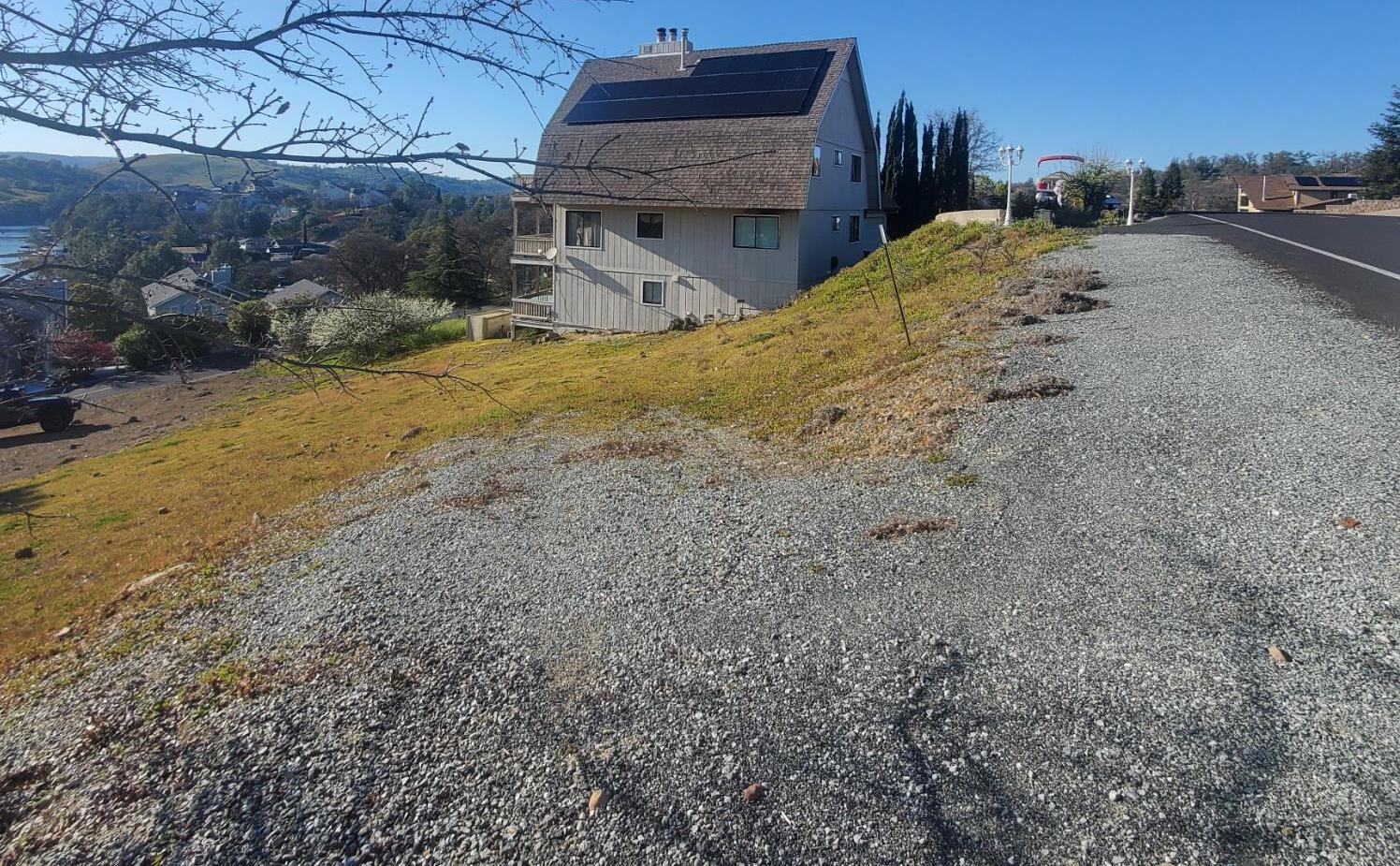 572 Poker Flat Road Copperopolis, CA 95228 - Photo 15 of 34 a view of a backyard of the house