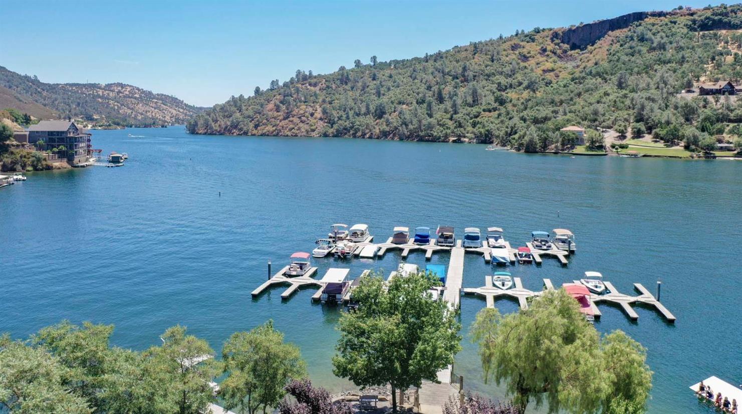 572 Poker Flat Road Copperopolis, CA 95228 - Photo 19 of 34 a view of a lake with a mountain in the background