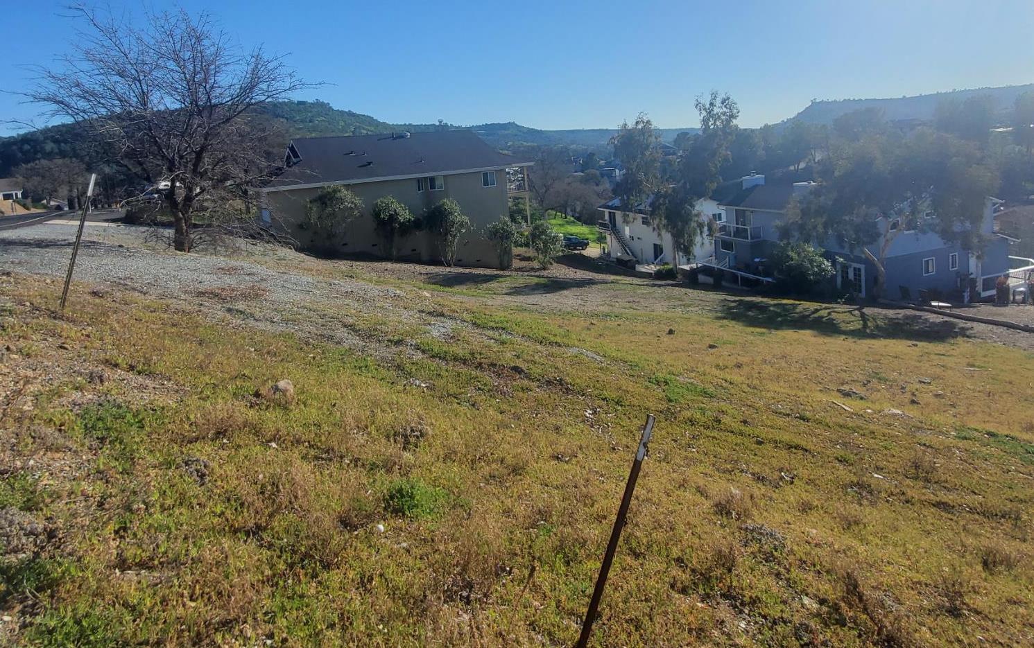 572 Poker Flat Road Copperopolis, CA 95228 - Photo 10 of 34 a view of a yard with a house